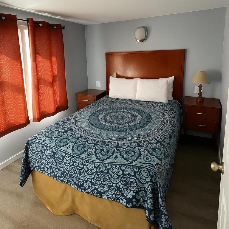 Atlantic Breeze Motel &amp; Apartments客房内的一张或多张床位