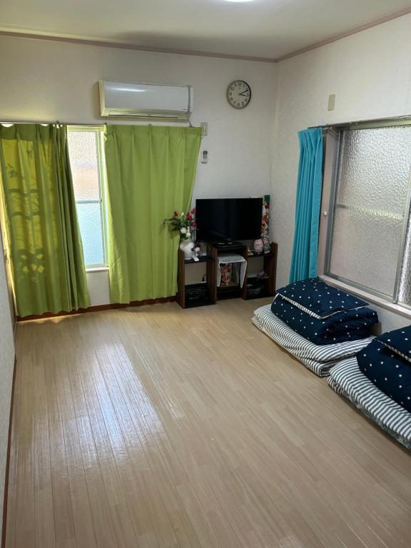 ハイツドリーム梦想小屋的电视和&#47;或娱乐中心