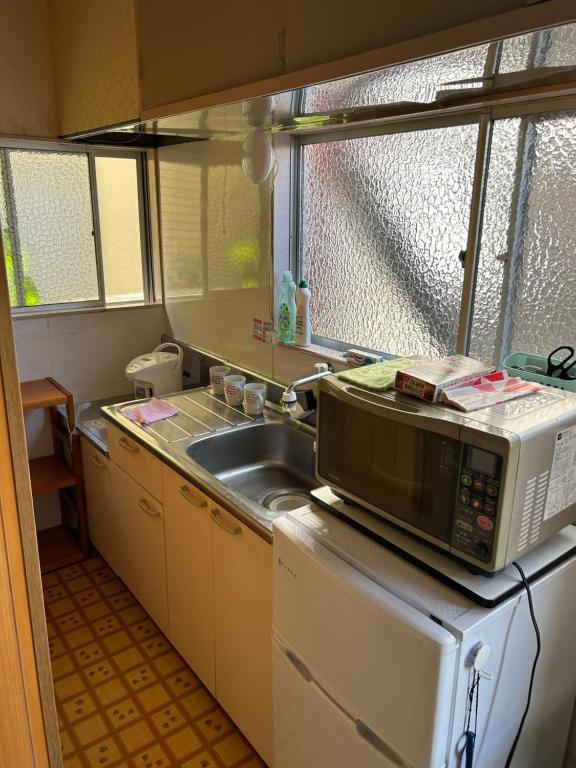ハイツドリーム梦想小屋的厨房或小厨房