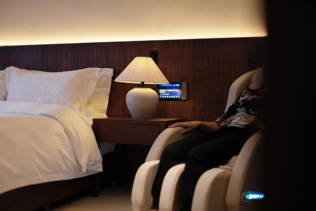 Chuanxing Yinli Hotel Chengdu Kuanzhai Alley Branch, with free welcome wine and afternoon tea客房内的一张或多张床位