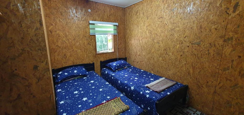 Chalet Kampong Guar, Manong客房内的一张或多张床位