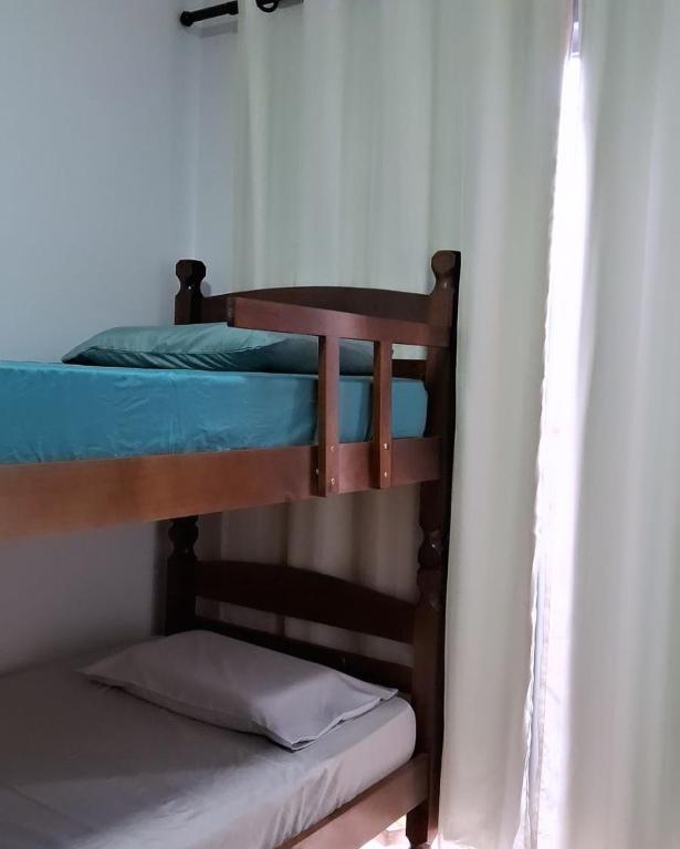 Casa Em Busca客房内的一张或多张床位