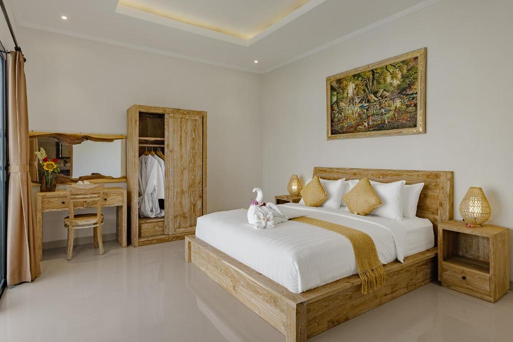 Luxury Nanda villa Ubud客房内的一张或多张床位