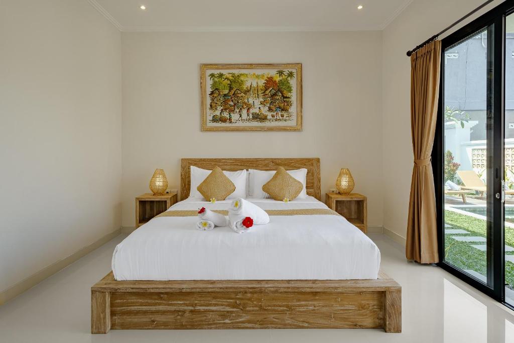 Luxury Nanda villa Ubud客房内的一张或多张床位