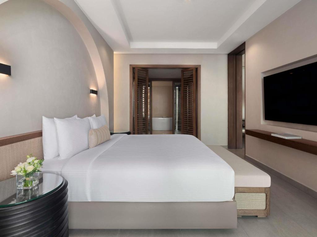 Rixos The Palm Hotel &amp; Suites - Ultra All Inclusive客房内的一张或多张床位