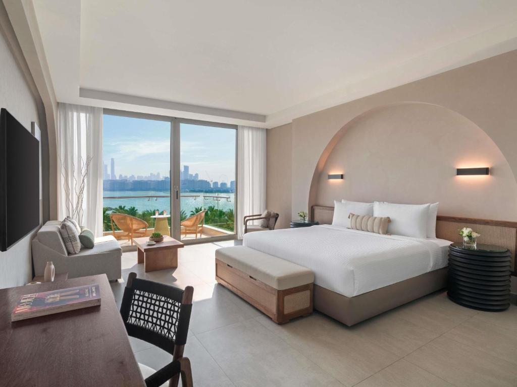 Rixos The Palm Hotel &amp; Suites - Ultra All Inclusive客房内的一张或多张床位