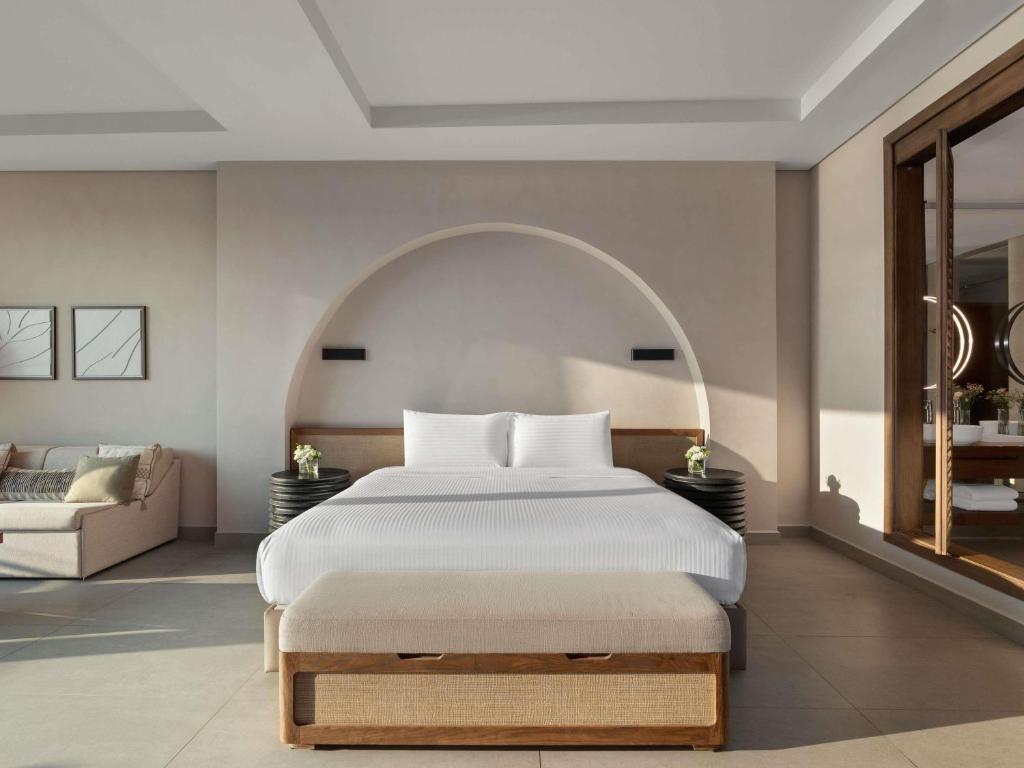 Rixos The Palm Hotel &amp; Suites - Ultra All Inclusive客房内的一张或多张床位