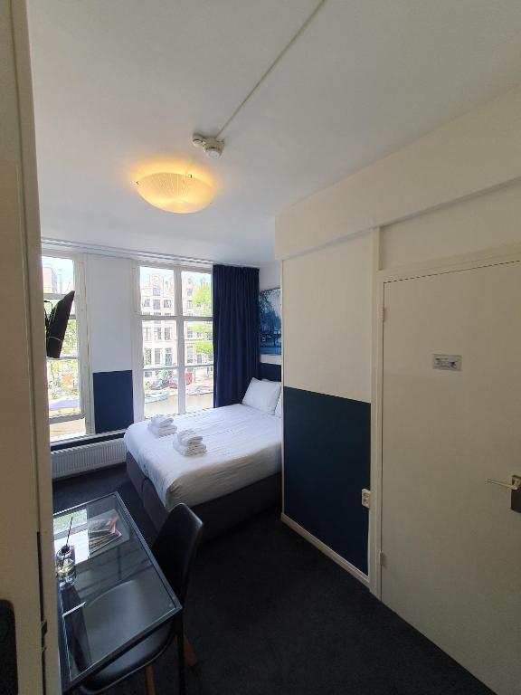 Hotel Hoksbergen客房内的一张或多张床位