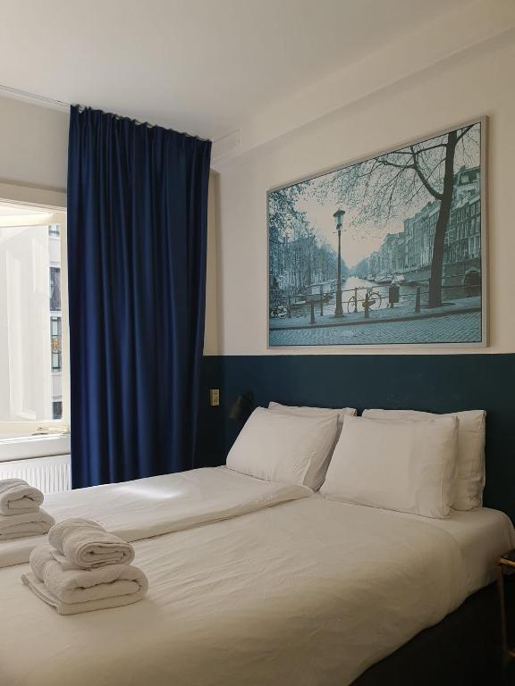 Hotel Hoksbergen客房内的一张或多张床位
