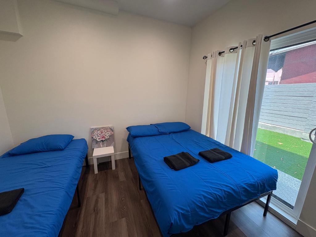 The Blue Hostel客房内的一张或多张床位