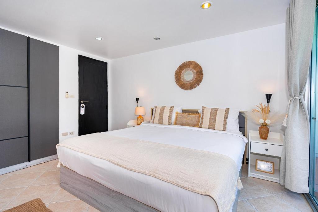 Kata Station Boutique Hotel客房内的一张或多张床位