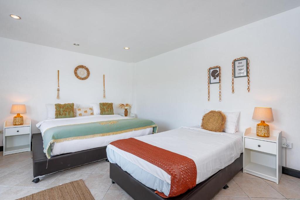 Kata Station Boutique Hotel客房内的一张或多张床位