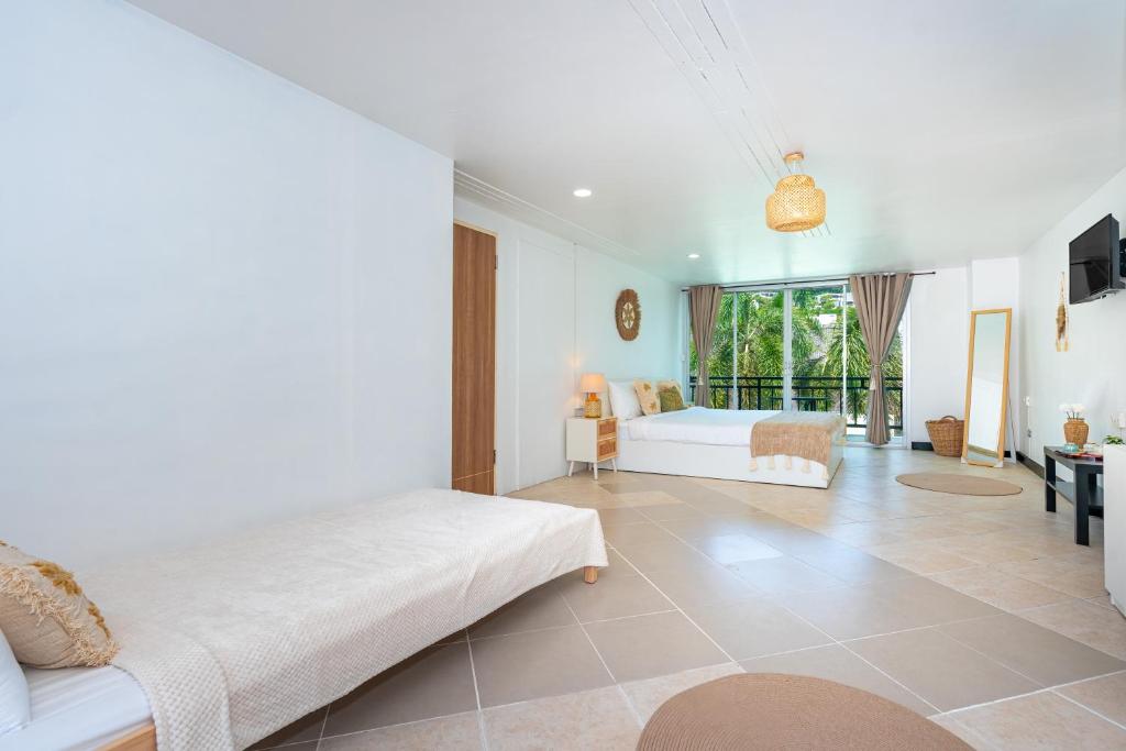 Kata Station Boutique Hotel客房内的一张或多张床位
