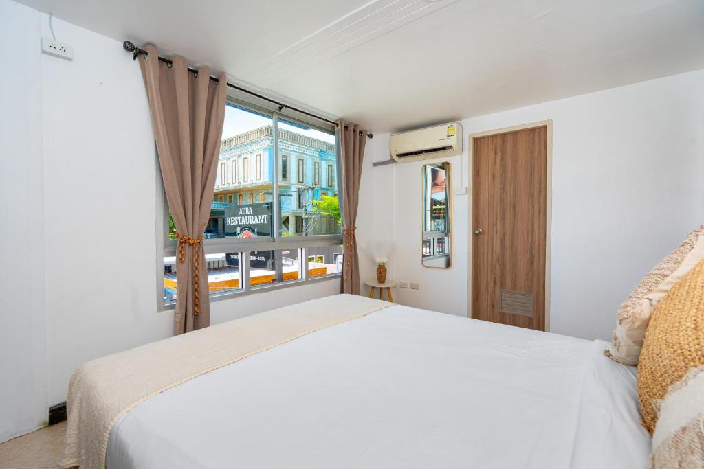 Kata Station Boutique Hotel客房内的一张或多张床位