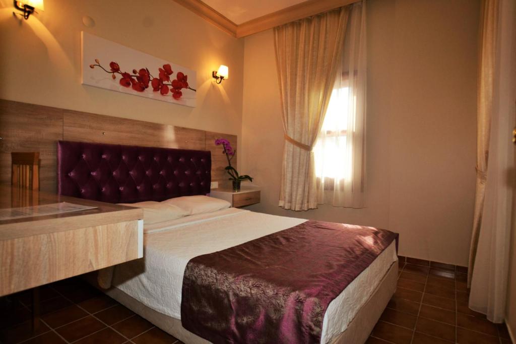Hotel Konak Su客房内的一张或多张床位