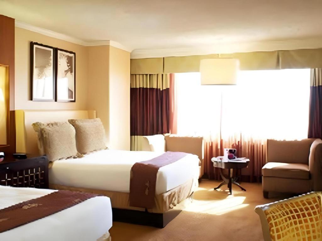 Harrahs Hotel Reno客房内的一张或多张床位