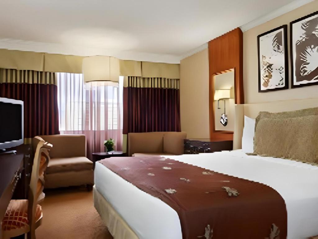 Harrahs Hotel Reno客房内的一张或多张床位
