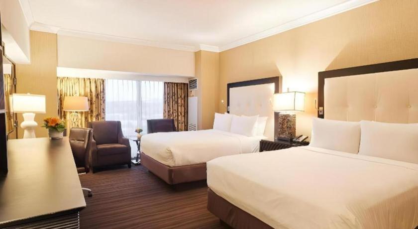 Atlantis Casino Resort Spa客房内的一张或多张床位