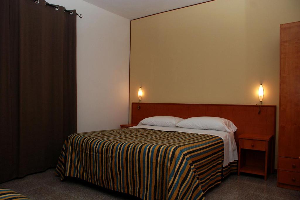 圣尤菲米亚住宿加早餐旅馆客房内的一张或多张床位