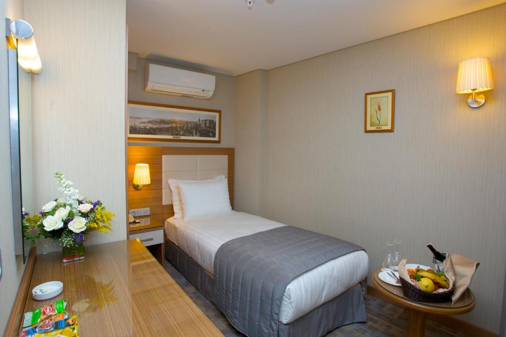 伊斯坦布尔翠德酒店客房内的一张或多张床位