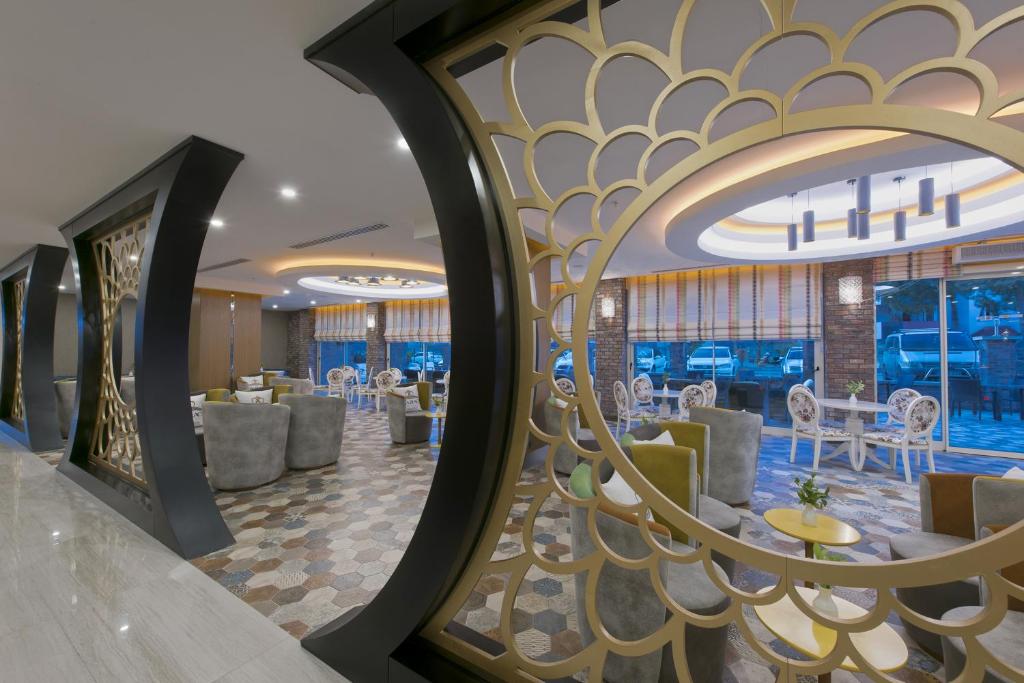 亚洲海滩度假村 ＆ Spa酒店餐厅或其他用餐的地方
