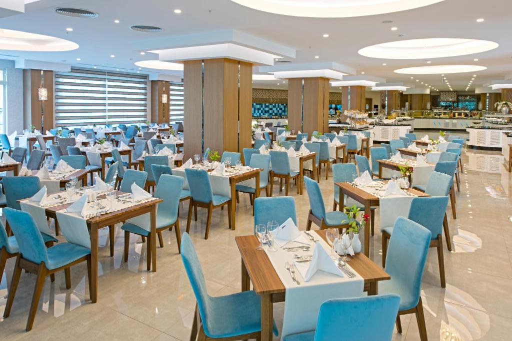 亚洲海滩度假村 ＆ Spa酒店餐厅或其他用餐的地方