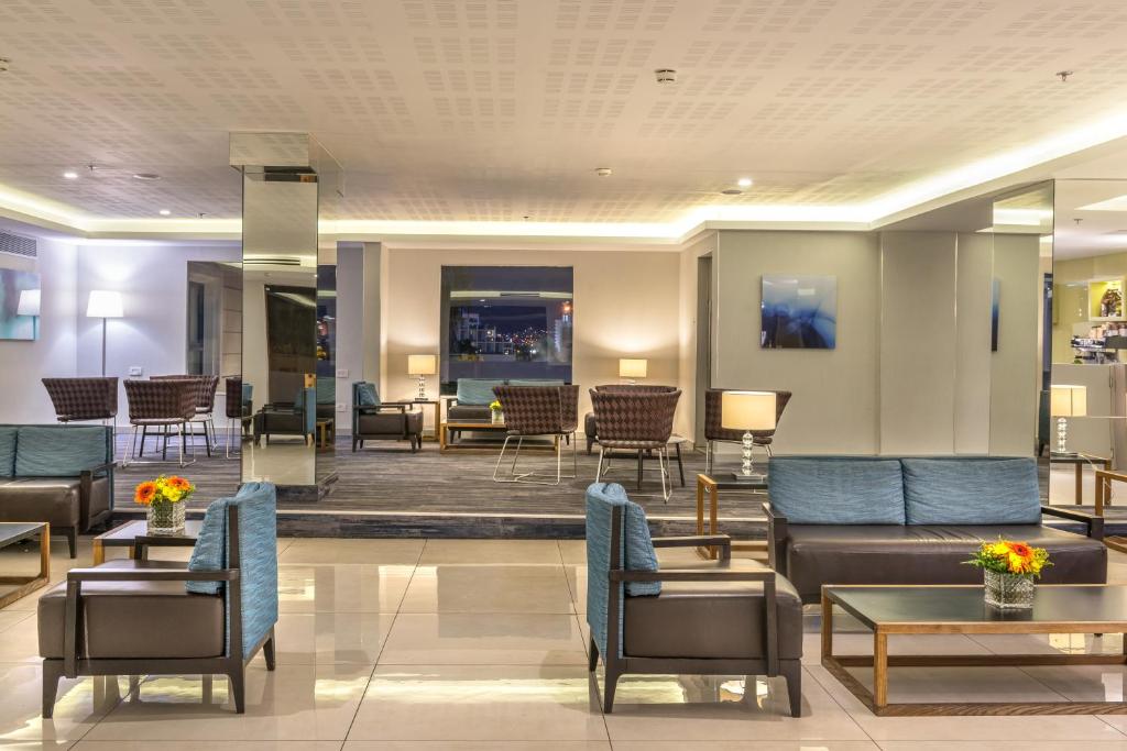 Hotel Astral Nirvana Club- Half Board的休息区