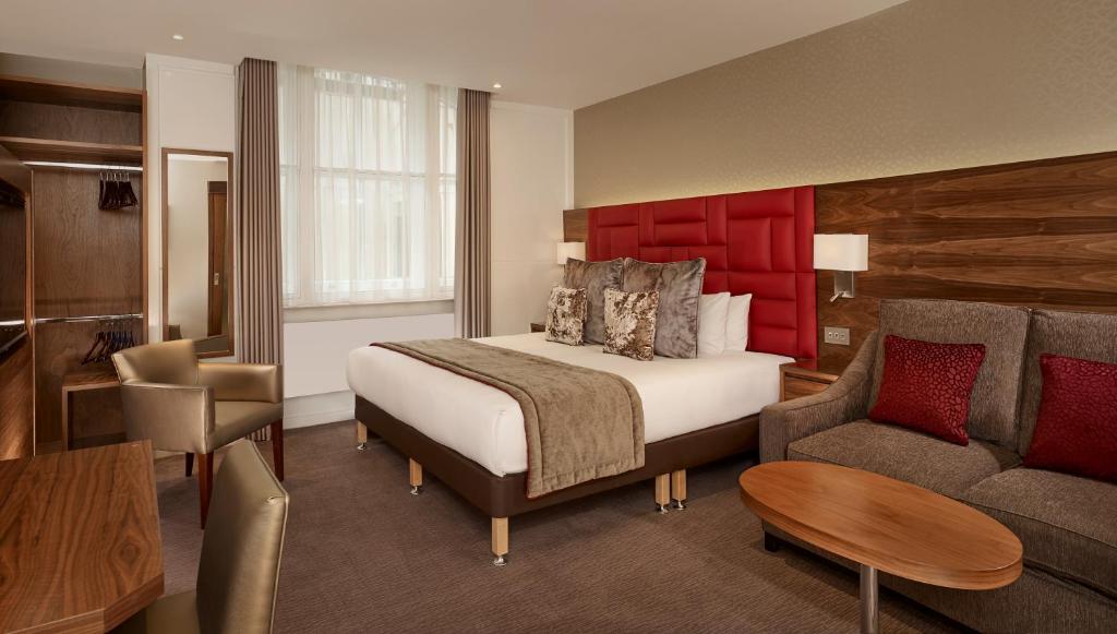 诺福克塔帕丁顿酒店客房内的一张或多张床位