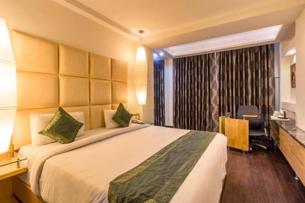 新德里机场大酒店 客房内的一张或多张床位