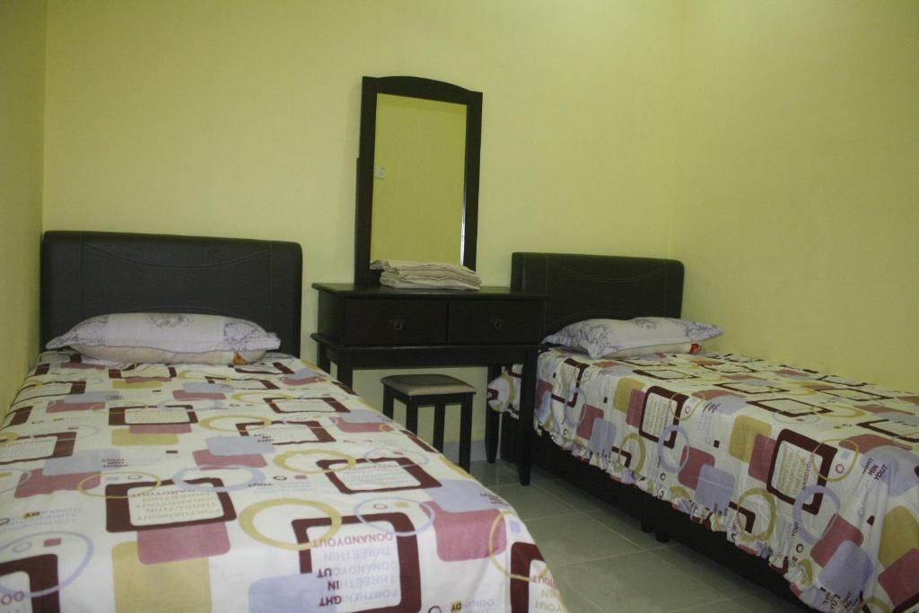 马林贾家庭旅馆客房内的一张或多张床位