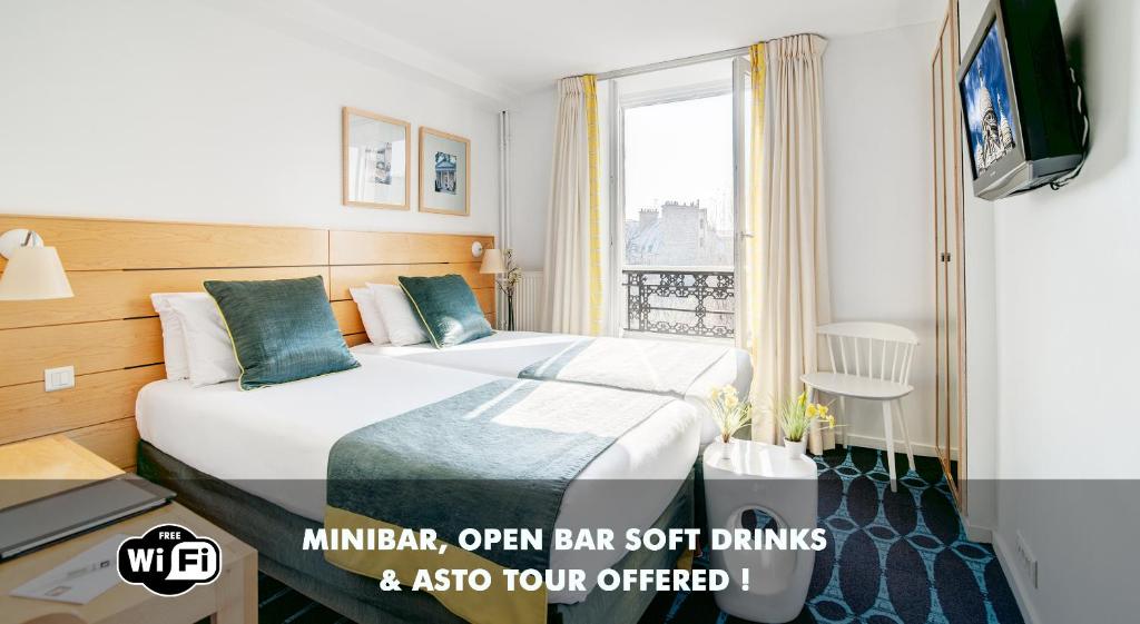 巴黎洛雷特阿斯托特尔酒店的酒店客房设有床和窗户。