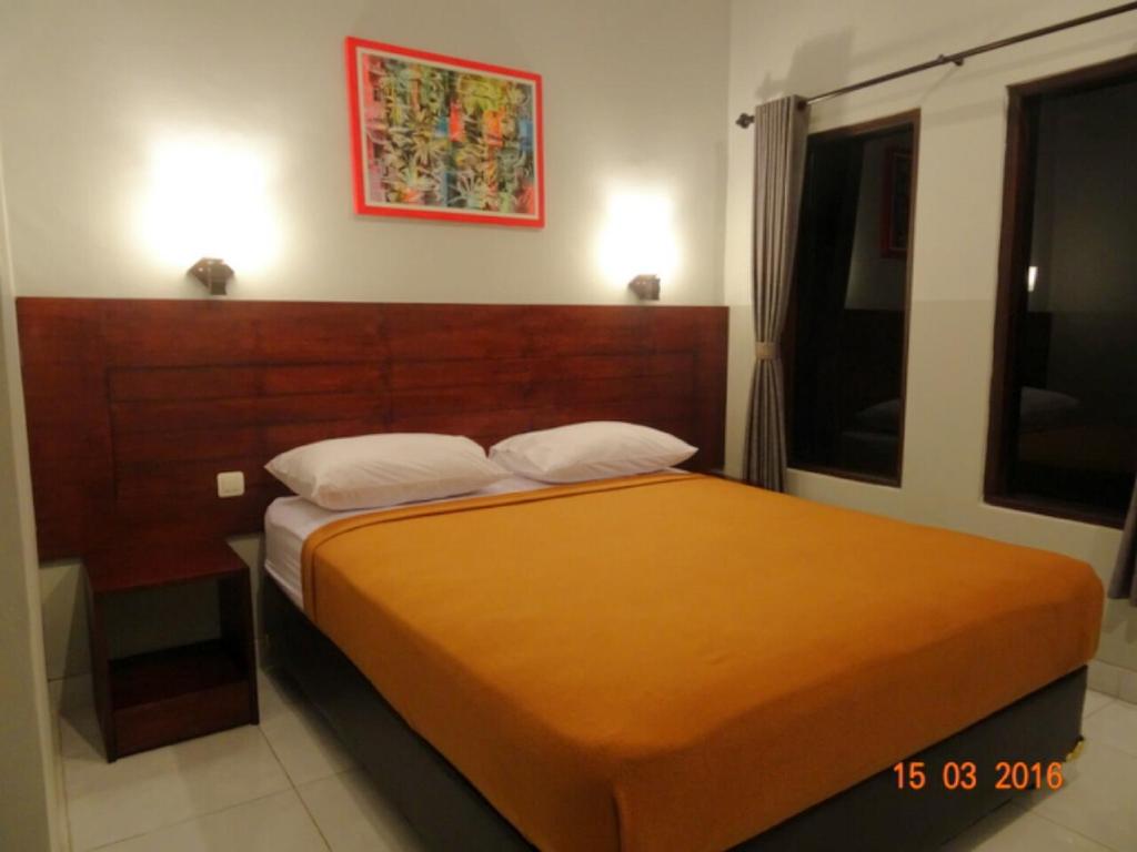 塔拉巴厘岛住宅公寓客房内的一张或多张床位