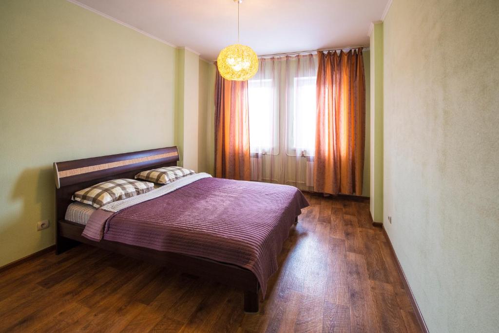 Apartament "Berloga 55" on Mayakovskogo客房内的一张或多张床位