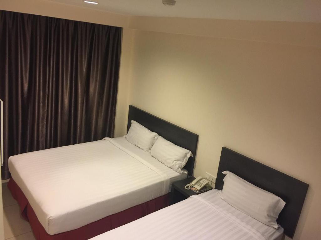 普瑞米尔兹酒店客房内的一张或多张床位