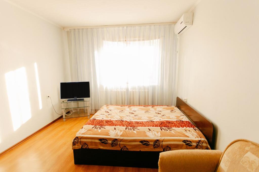 1-room Apartment in city Centre on Maksima Gorkogo street 83客房内的一张或多张床位