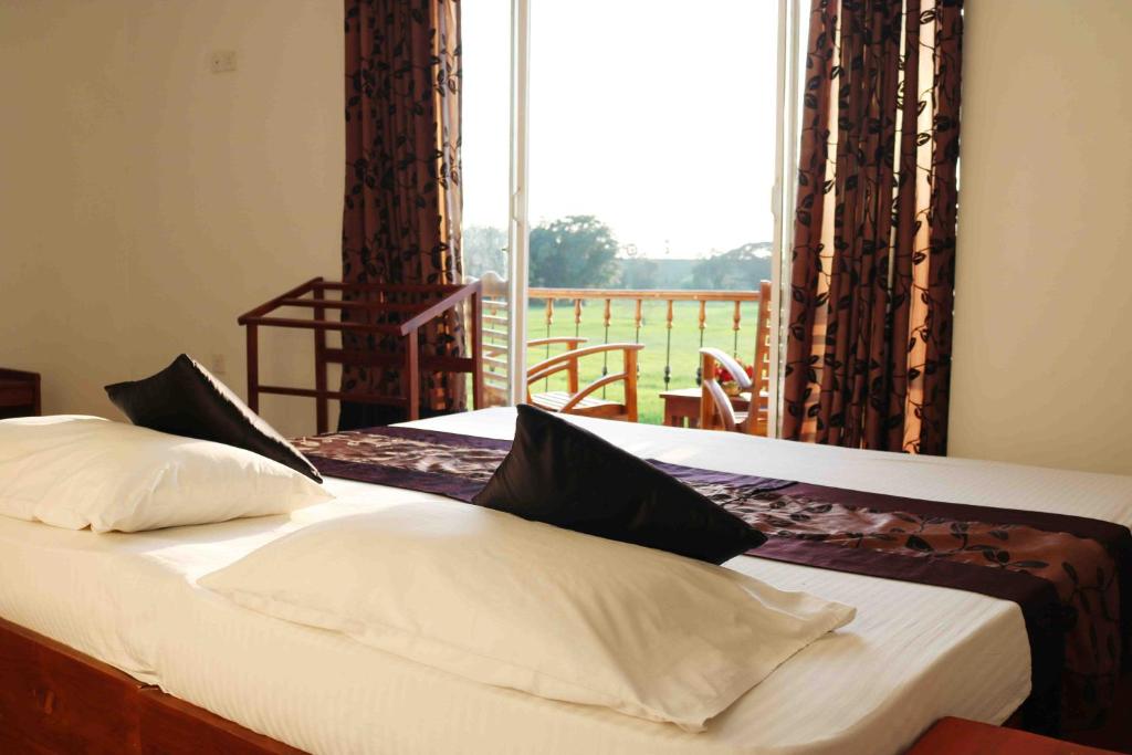 曼内尔旅馆客房内的一张或多张床位