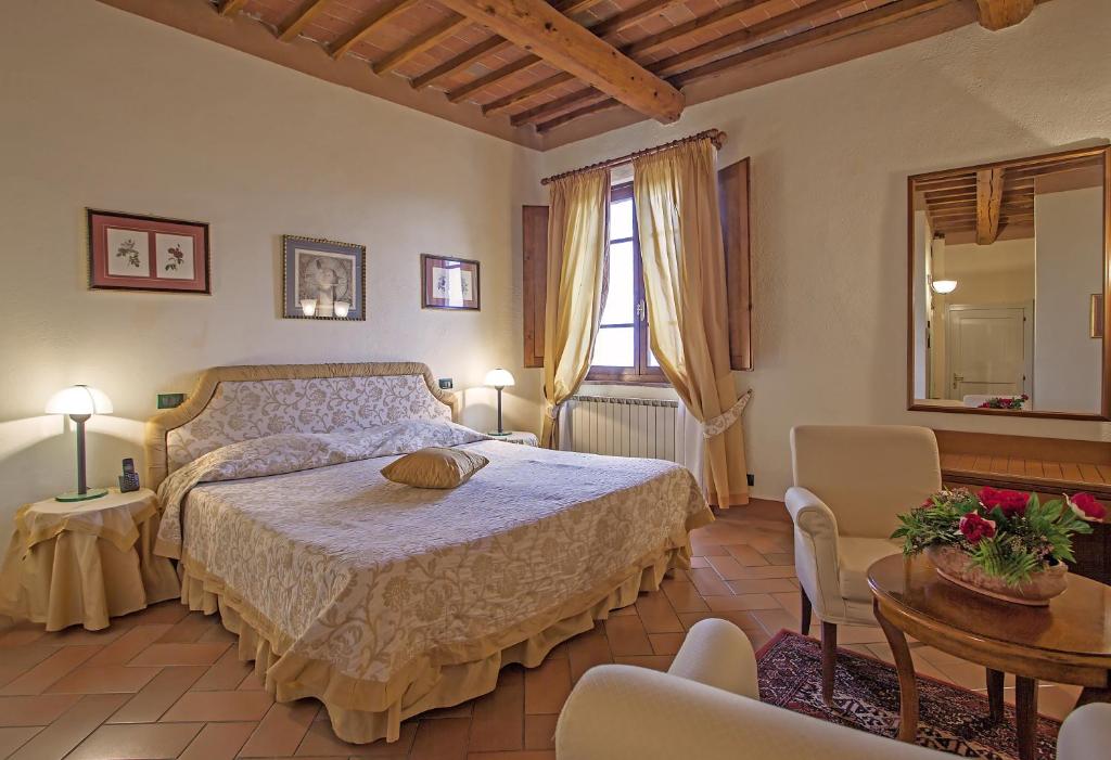 瑞雷斯切奥斯托迪皮耶扎酒店客房内的一张或多张床位