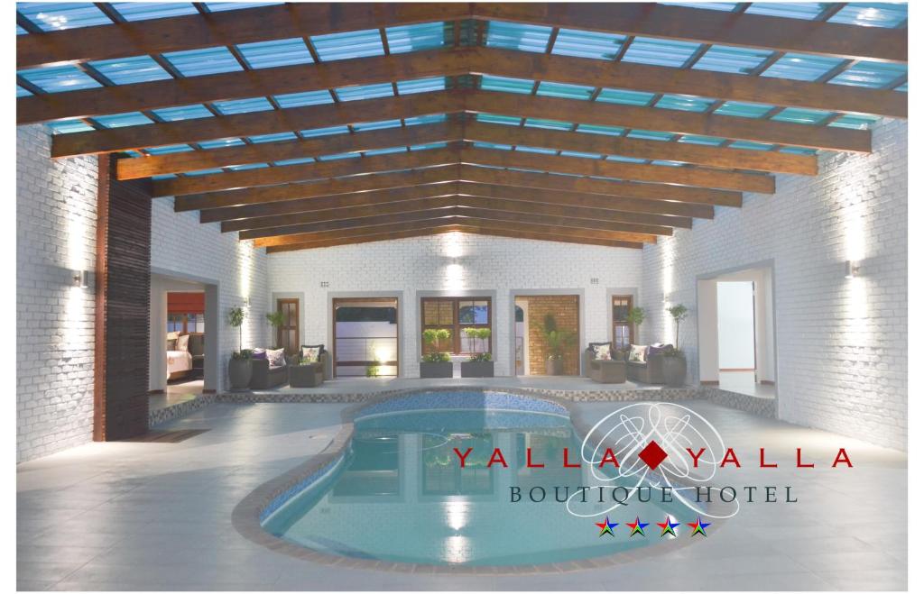 威特班克雅拉雅拉精品酒店 的 ⁇ 染带游泳池的别墅