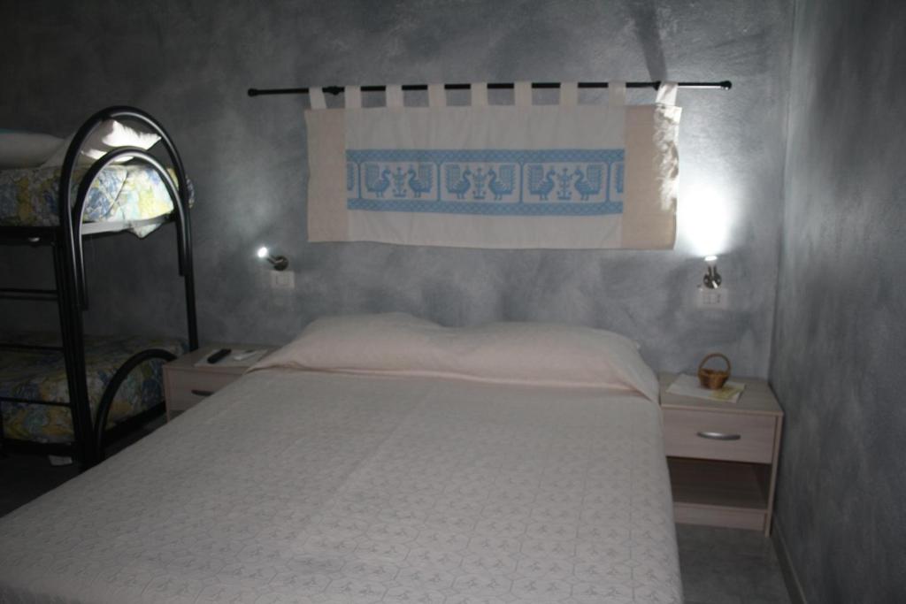 La Pavoncella客房内的一张或多张床位