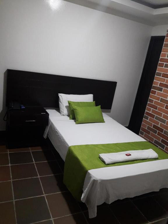 Hotel Valle de Beraca客房内的一张或多张床位