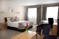 Best Western Moores Central Hotel客房内的一张或多张床位