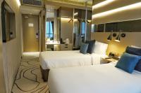 The Harbourview - Chinese YMCA of Hong Kong客房内的一张或多张床位