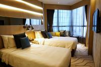 The Harbourview - Chinese YMCA of Hong Kong客房内的一张或多张床位