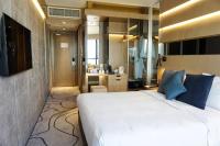 The Harbourview - Chinese YMCA of Hong Kong客房内的一张或多张床位