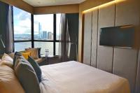 The Harbourview - Chinese YMCA of Hong Kong客房内的一张或多张床位