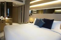 The Harbourview - Chinese YMCA of Hong Kong客房内的一张或多张床位