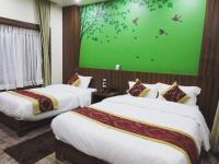Jungle Safari Lodge- Serenity in the Wild客房内的一张或多张床位