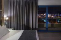 Hotel Astral Nirvana Club- Half Board客房内的一张或多张床位