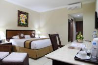 The Jayakarta Bali Beach Resort客房内的一张或多张床位