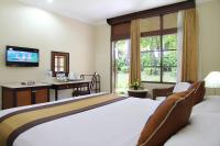 The Jayakarta Bali Beach Resort客房内的一张或多张床位